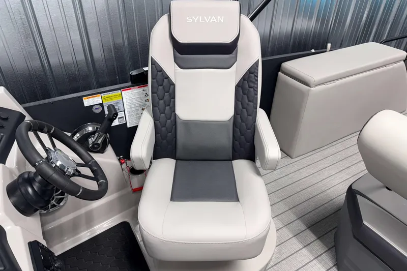 Slide: The Image of Captain's chair in 2026 Sylvan L3 DLZ Platinum boat, featuring sleek design and modern controls. - 11
