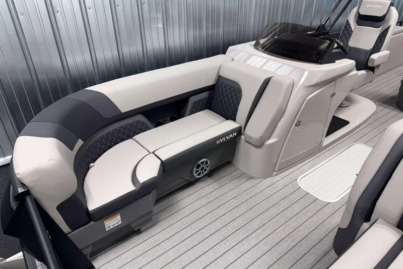 Slide: The Image of 2026 Sylvan L3 DLZ Platinum boat interior with luxurious seating and modern design. - 2