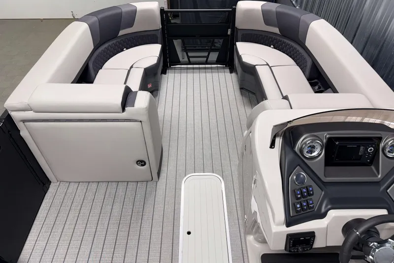 Slide: The Image of 2026 Sylvan L3 DLZ Platinum pontoon boat interior with luxurious seating and modern dashboard. - 6