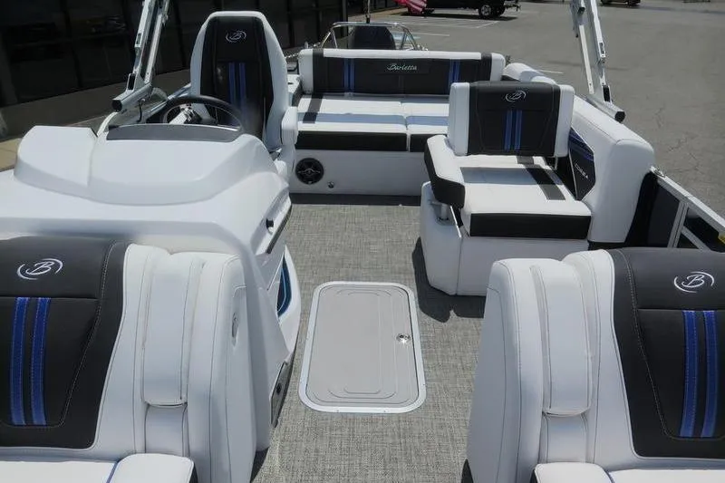 Slide: The Image of 2025 Barletta Corsa 23U boat interior with stylish seating and modern design. - 10