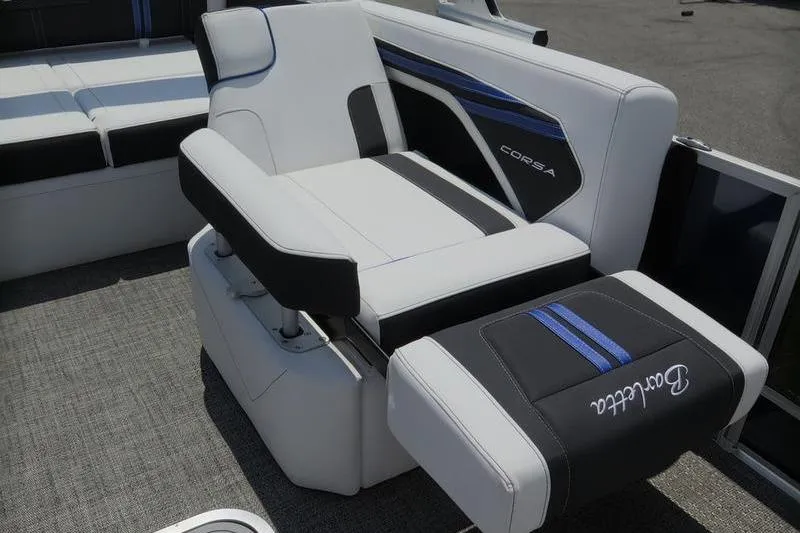 Slide: The Image of 2025 Barletta Corsa 23U boat interior with stylish seating and modern design. - 23