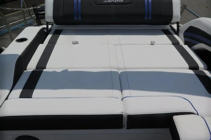 Slide: The Image of 2025 Barletta Corsa 23U boat interior with sleek white and black seating. - 26