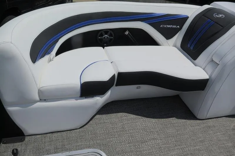Slide: The Image of 2025 Barletta Corsa 23U boat interior with white and black seating, blue accents. - 7