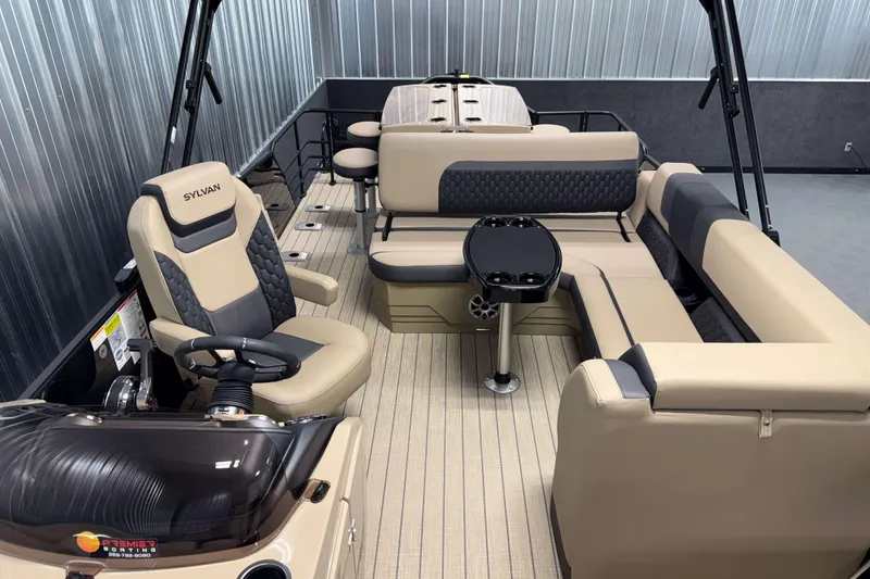 Slide: The Image of 2026 Sylvan L3 DLZ Bar pontoon boat interior with luxurious seating and modern design. - 15