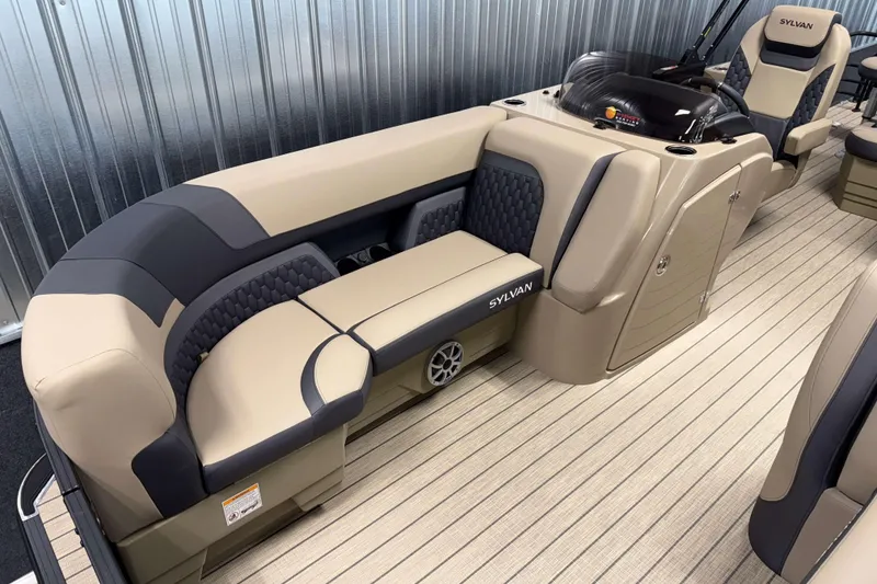 Slide: The Image of 2026 Sylvan L3 DLZ Bar pontoon boat interior with luxurious seating and modern design. - 2