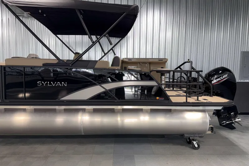 Slide: The Image of 2026 Sylvan L3 DLZ Bar pontoon boat with Mercury outboard motor in showroom. - 28