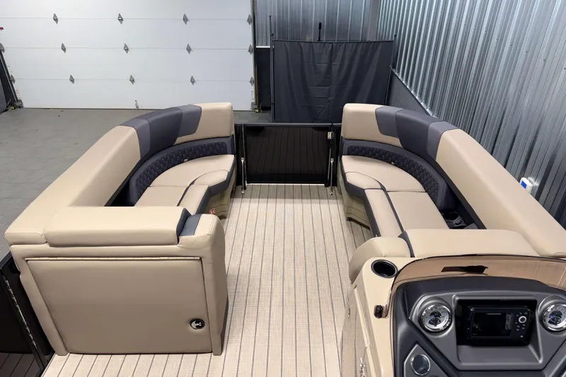 Slide: The Image of 2026 Sylvan L3 DLZ Bar pontoon boat interior with luxurious seating and modern dashboard. - 6