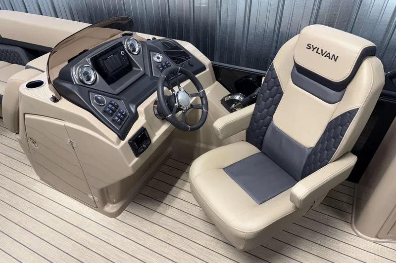 Slide: The Image of 2026 Sylvan L3 DLZ Bar boat interior with modern helm and luxurious captain's chair. - 8