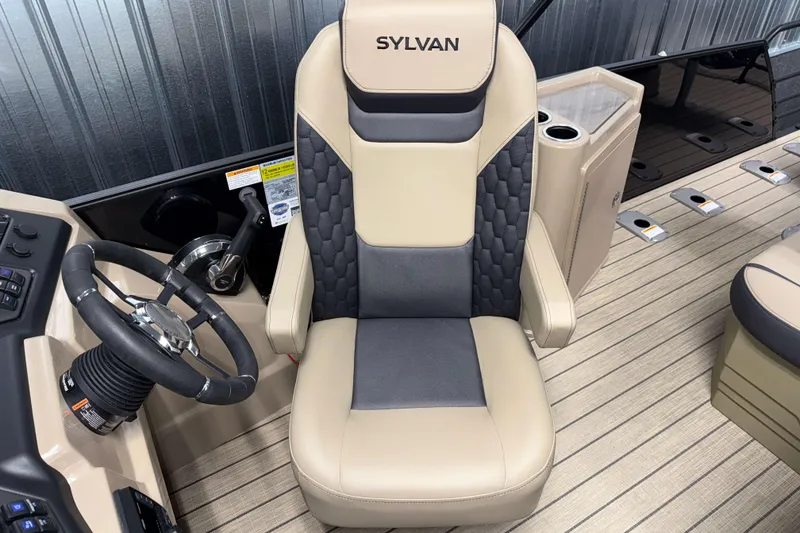 Slide: The Image of Captain's chair on 2026 Sylvan L3 DLZ Bar boat, featuring sleek design and modern controls. - 9