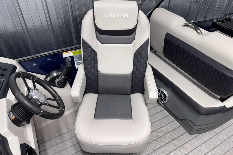 Slide: The Image of Captain's chair in 2026 Sylvan L3 RLZ boat, featuring modern design and controls. - 11