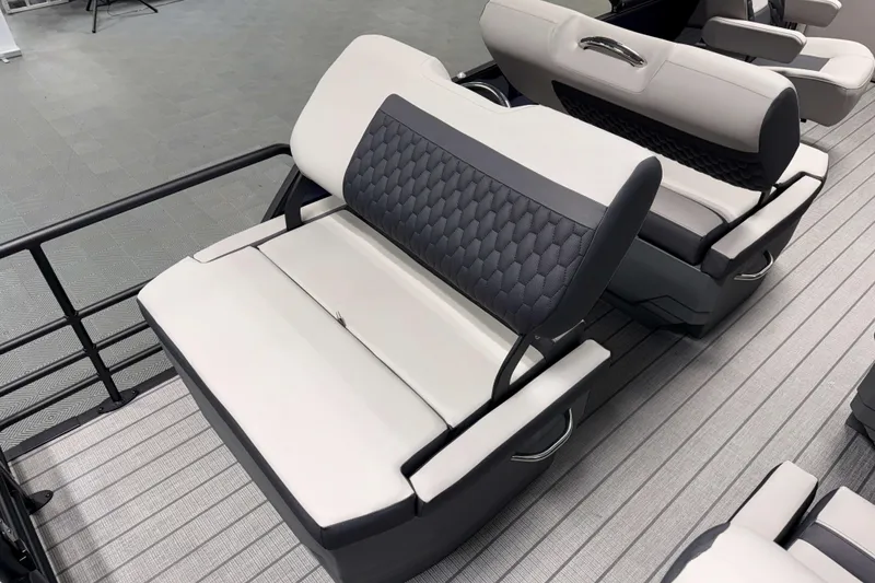 Slide: The Image of 2026 Sylvan L3 RLZ boat interior with modern seating design and textured upholstery. - 20