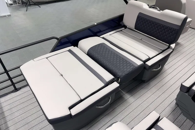 Slide: The Image of 2026 Sylvan L3 RLZ boat interior with luxurious seating and modern design. - 21