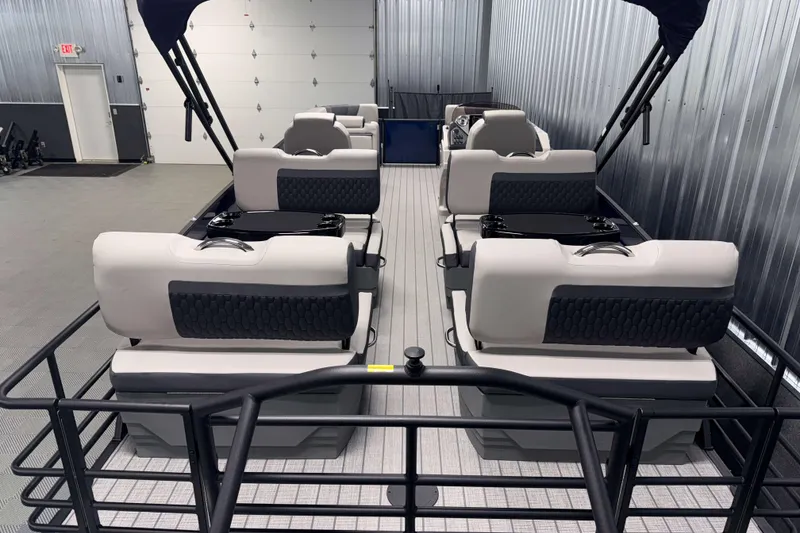 Slide: The Image of 2026 Sylvan L3 RLZ pontoon boat interior with plush seating and sleek design. - 29