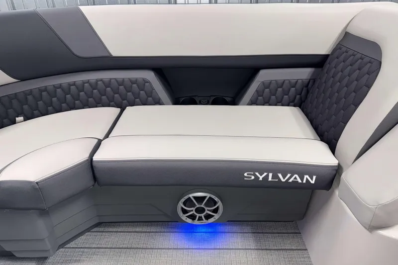 Slide: The Image of 2026 Sylvan L3 RLZ boat interior with stylish seating and ambient blue lighting. - 3