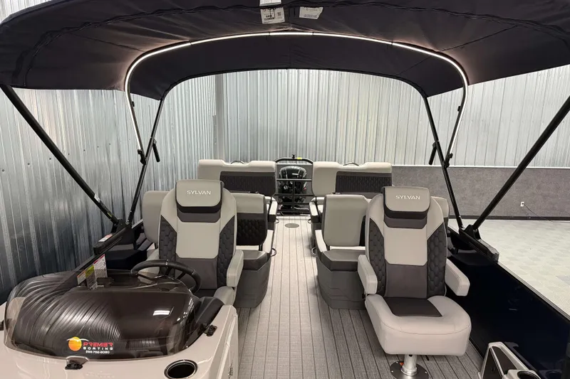Slide: The Image of 2026 Sylvan L3 RLZ pontoon boat interior with modern seating and canopy. - 8