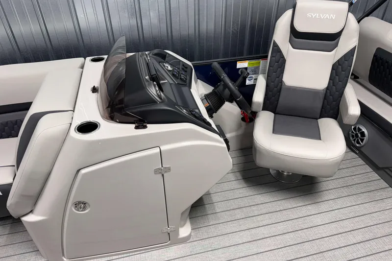 Slide: The Image of 2026 Sylvan L3 RLZ boat interior with modern helm and comfortable seating. - 9