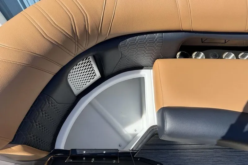 Slide: The Image of Luxurious seating detail of 2026 Premier 230 Intrigue RF boat interior. - 15