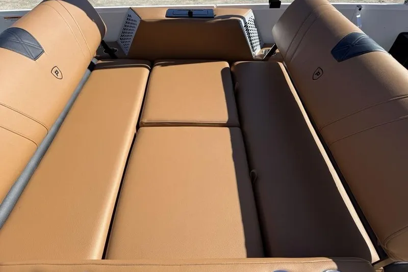 Slide: The Image of Luxurious tan seating on 2026 Premier 230 Intrigue RF boat, showcasing comfort and style. - 36
