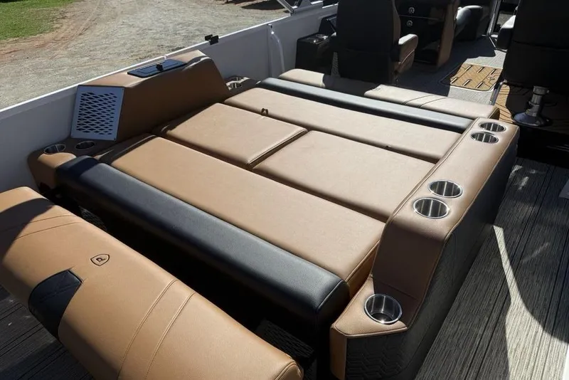 Slide: The Image of Luxurious seating area on 2026 Premier 230 Intrigue RF boat with cup holders and leather upholstery. - 39