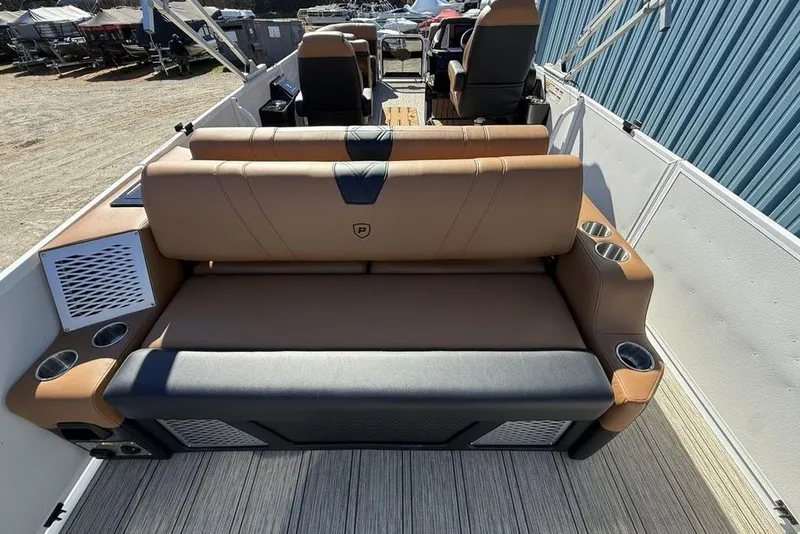 Slide: The Image of Luxurious seating on 2026 Premier 230 Intrigue RF boat with cup holders and modern design. - 44