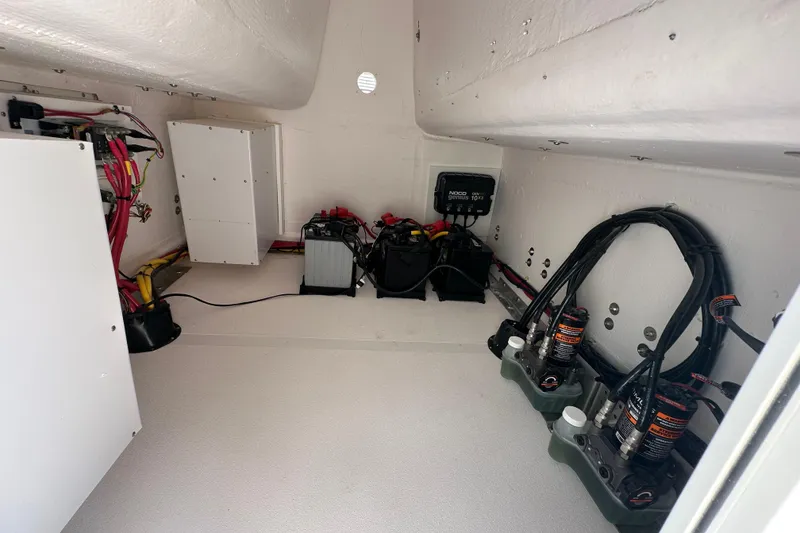 Slide: The Image of Interior of 2026 Twin Vee 340 GFX2 CC boat showing electrical components and wiring. - 19