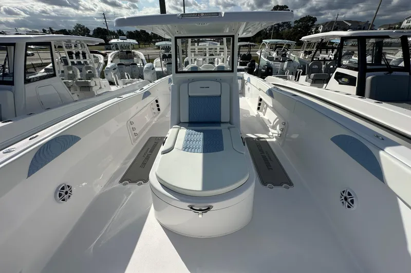 Slide: The Image of 2026 Twin Vee 340 GFX2 CC boat interior with seating and modern design. - 9