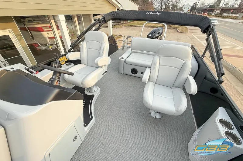 Slide: The Image of 2022 Bentley 243 Swingback boat interior with plush seating and modern helm. - 15