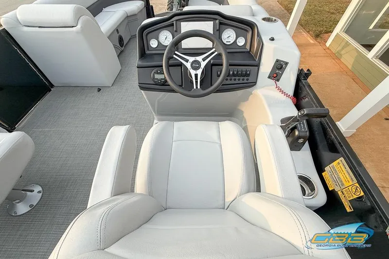 Slide: The Image of 2022 Bentley 243 Swingback boat interior with steering wheel and control panel. - 23