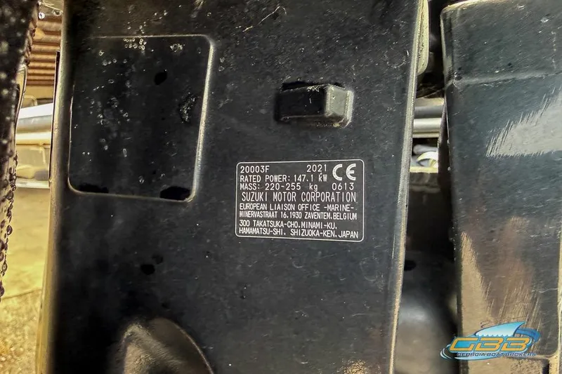 Slide: The Image of Close-up of a Suzuki Motor Corporation label on a Bentley 243 Swingback, 2022 model. - 26