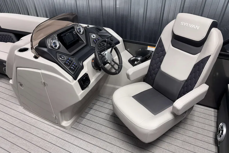 Slide: The Image of 2026 Sylvan L3 RLZ boat cockpit with modern steering and comfortable seating. - 10
