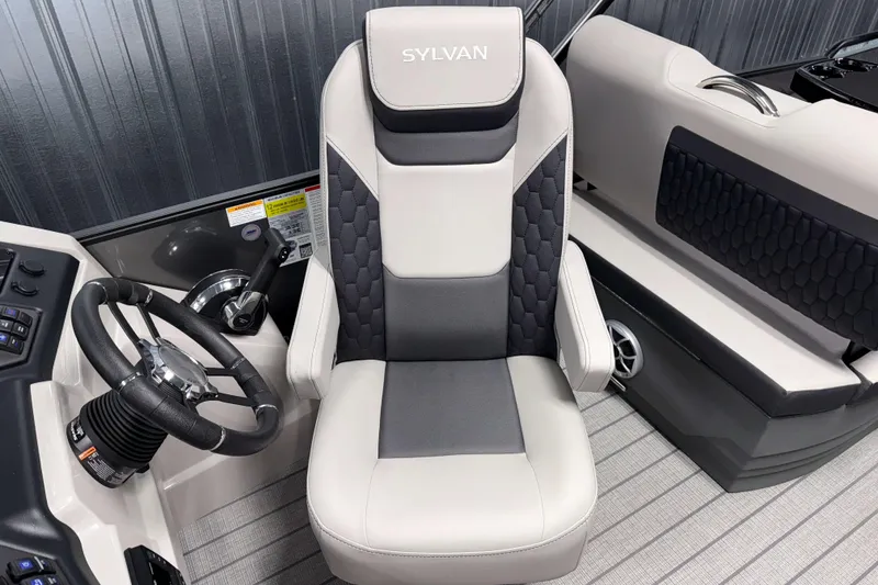 Slide: The Image of Captain's chair in 2026 Sylvan L3 RLZ boat, featuring sleek design and modern controls. - 11