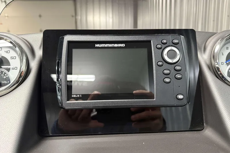 Slide: The Image of Dashboard of 2026 Sylvan L3 RLZ with Humminbird Helix 5 display. - 14