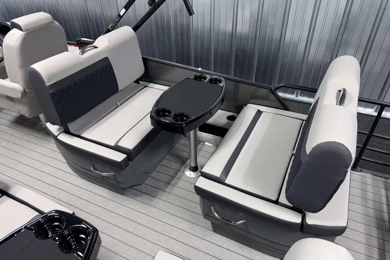 Slide: The Image of Luxurious seating area on 2026 Sylvan L3 RLZ boat with modern design and cup holders. - 21
