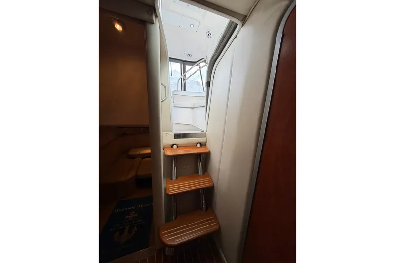Slide: The Image of Interior stairs of 2007 Rinker 370 Express Cruiser Hard Top yacht. - 28