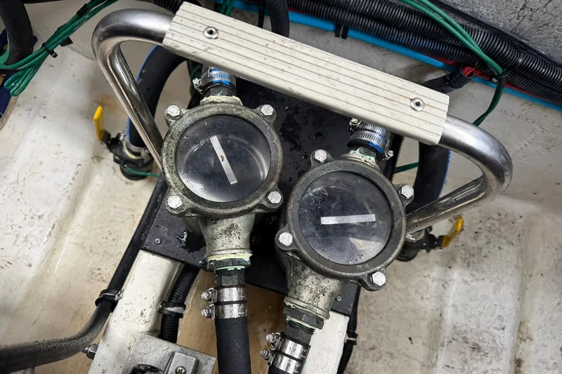 Slide: The Image of Engine room components of a 2007 Rinker 370 Express Cruiser Hard Top. - 33