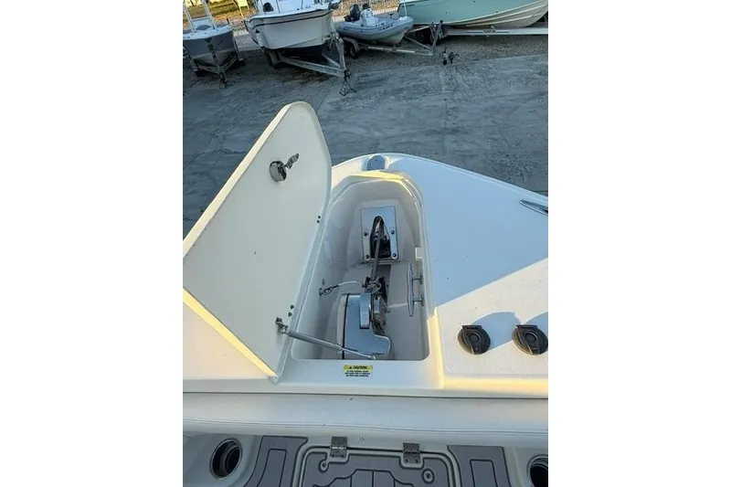 Slide: The Image of 2020 Grady-White Canyon 376 helm with steering wheel and control panel. - 22