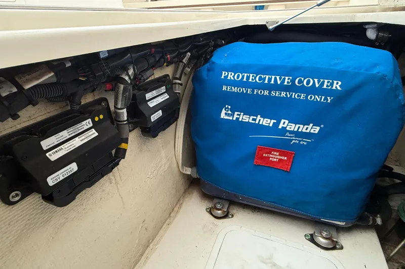 Slide: The Image of Protective cover on Fischer Panda generator in 2020 Grady-White Canyon 376 boat. - 33