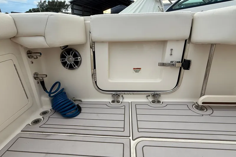 Slide: The Image of Interior view of a 2020 Grady-White Canyon 376 boat, featuring seating and deck details. - 34