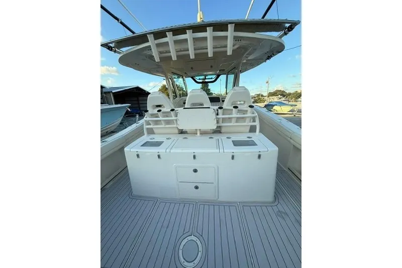 Slide: The Image of 2020 Grady-White Canyon 376 boat on trailer, rear view showing multiple outboard engines. - 9