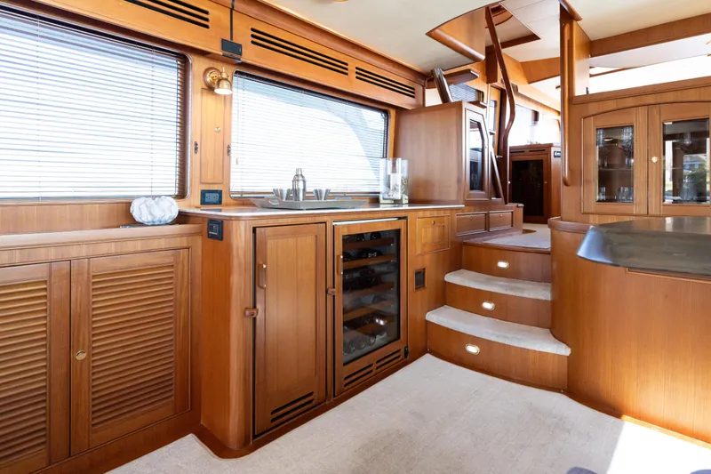 Slide: The Image of Marlow 72 GRIFFIN - Salon Steps to Elevated Galley and Dining - 40