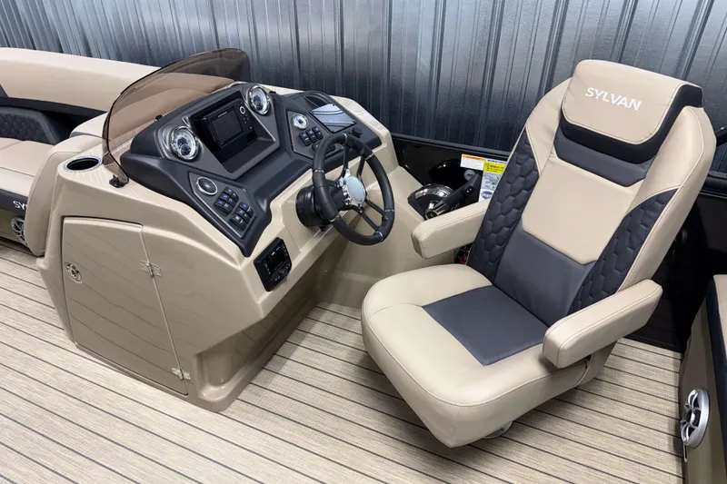 Slide: The Image of Captain's seat and helm of 2026 Sylvan L3 RLZ boat, featuring modern controls and design. - 10