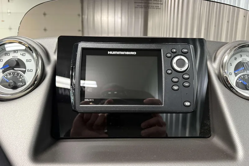 Slide: The Image of Dashboard of 2026 Sylvan L3 RLZ with Humminbird Helix 5 display. - 13