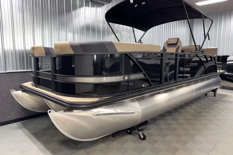 Slide: The Image of 2026 Sylvan L3 RLZ pontoon boat in showroom, featuring sleek design and modern seating. - 24