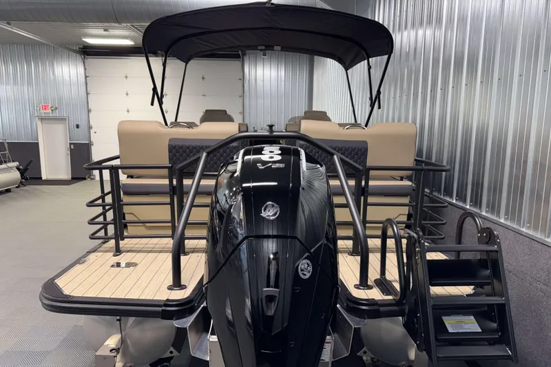 Slide: The Image of 2026 Sylvan L3 RLZ pontoon boat with V6 engine in a showroom. - 32