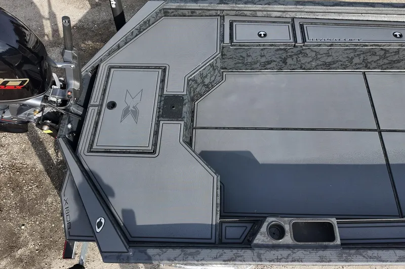 Slide: The Image of 2026 Xpress X18DB boat deck with sleek design and Hyper-Lift technology. - 8