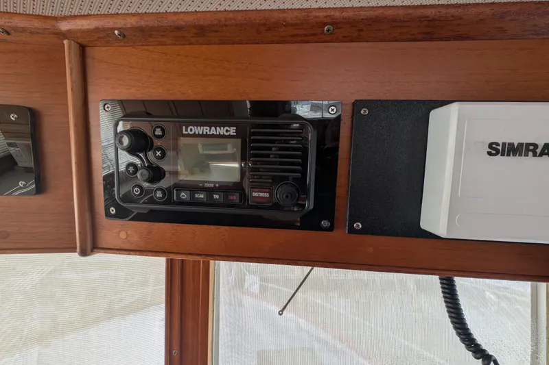 Slide: The Image of 1988 Grand Banks 46 Classic boat interior with Lowrance and Simrad navigation equipment. - 22
