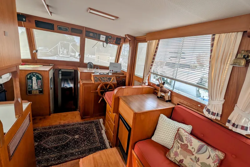 Slide: The Image of Interior of 1988 Grand Banks 46 Classic yacht with wood paneling and nautical decor. - 33