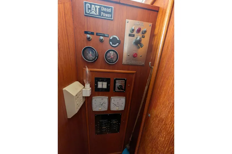 Slide: The Image of Control panel of a 1988 Grand Banks 46 Classic with CAT Diesel Power. - 34
