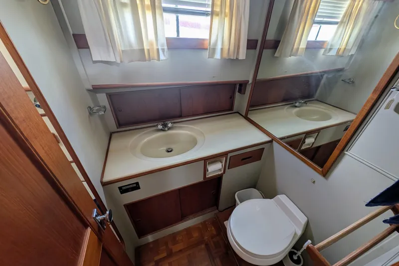 Slide: The Image of Bathroom interior of 1988 Grand Banks 46 Classic yacht with sink and toilet. - 40