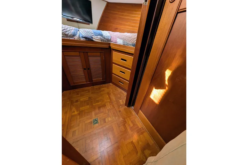 Slide: The Image of Interior of 1988 Grand Banks 46 Classic yacht with wood flooring and cabinetry. - 45